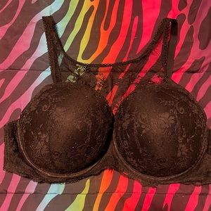 Well loved Victoria Secret lace bra. Cups are still perfectly molded, no holes.